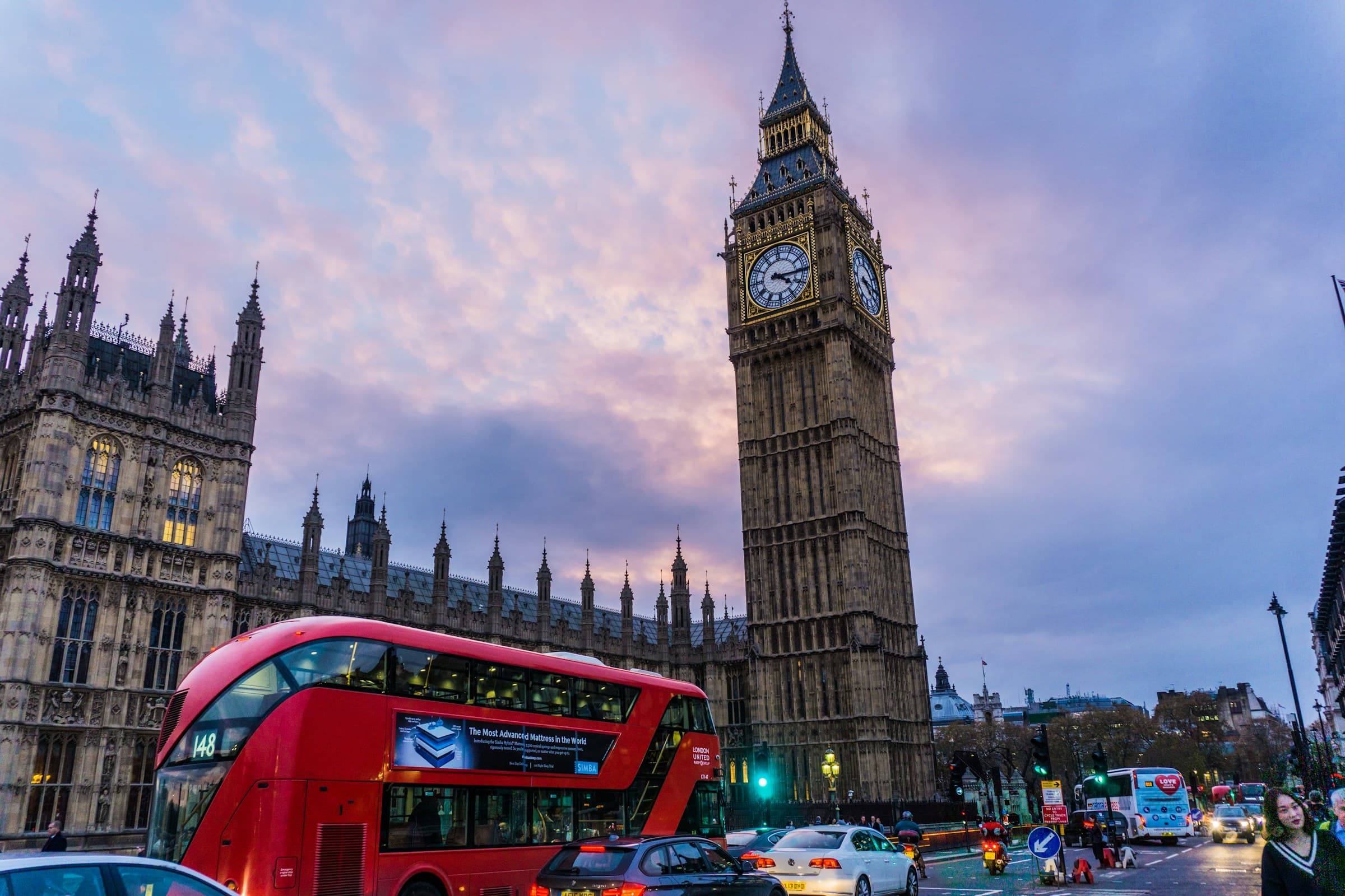 Big Ben and the Houses of Parliament at dusk with a red London bus — private Christmas lights and markets tour